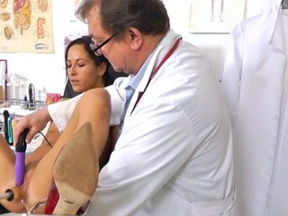 Busty girl in uniform masturbating with vibrator on the airb